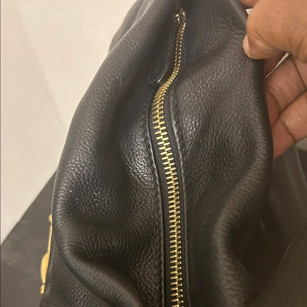 Michael Kors Black Hobo Bag with Gold Accents